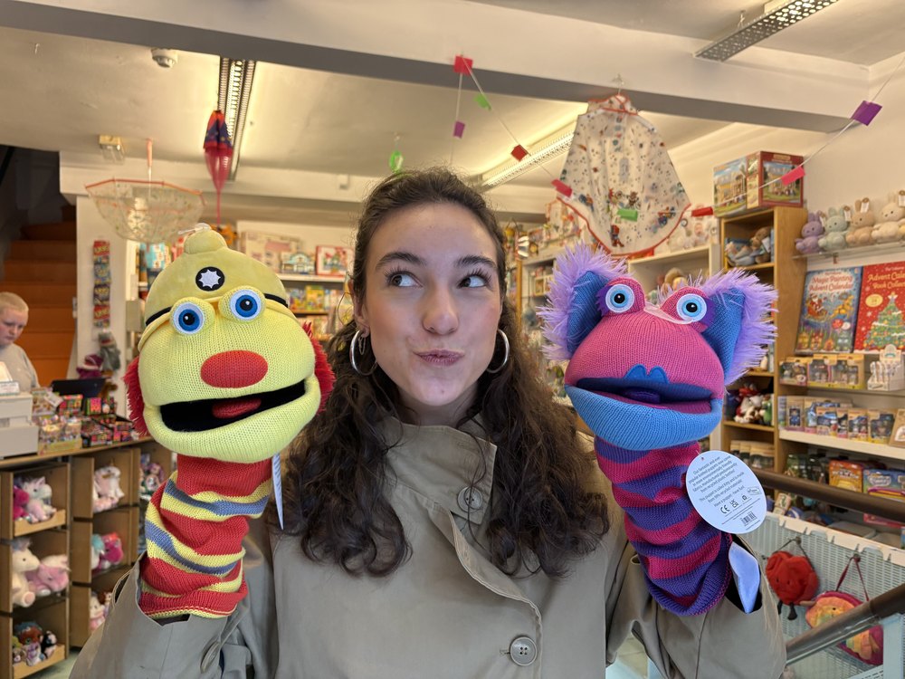Emma with two puppets